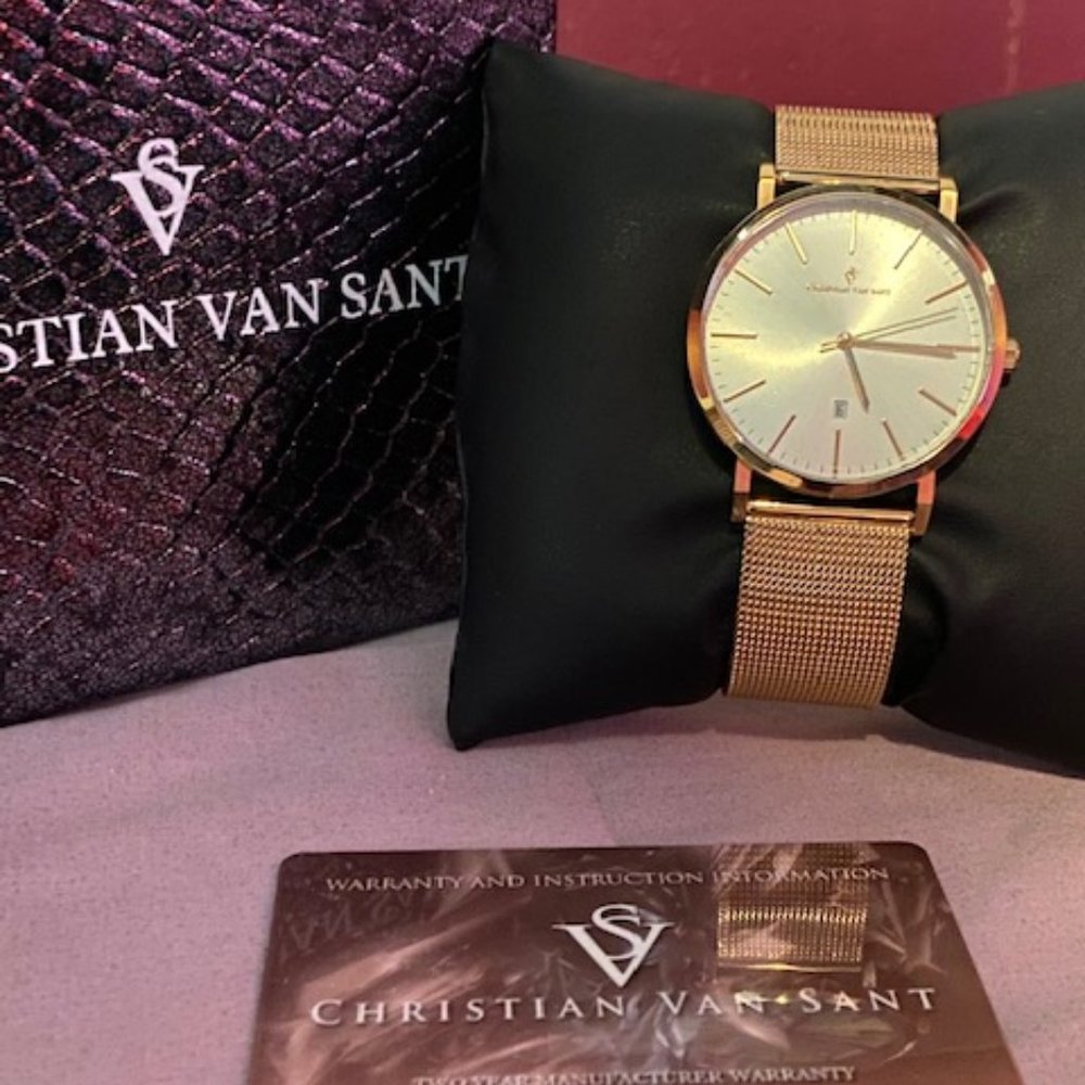 Mans watch with Gold bracelet band and pearl face.